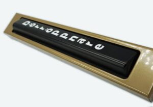 Specialtryck text armbågskontakt med lackad RAL färg